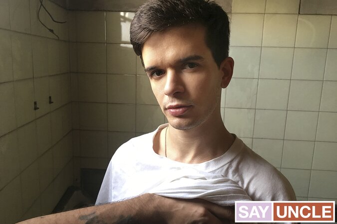 Sebastian licks cum off his lips after getting fucked