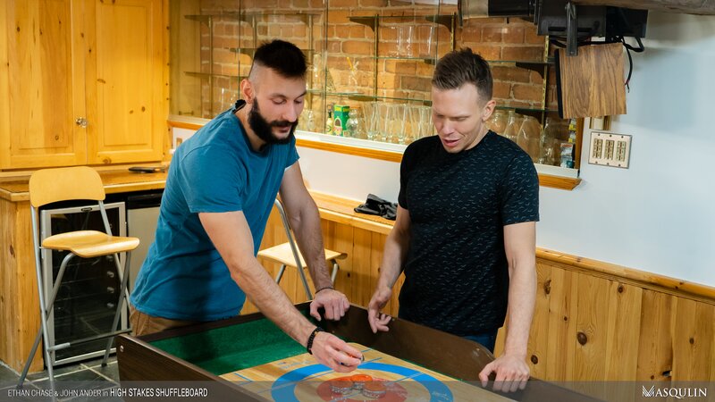 John Ander wins shuffleboard breeds Ethan Chase on the table