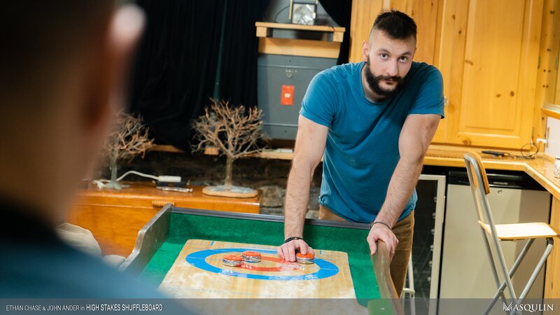 John Ander wins shuffleboard breeds Ethan Chase on the table