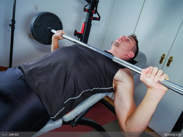 Jimmy Bud jerks huge cock on gym bench until he explodes