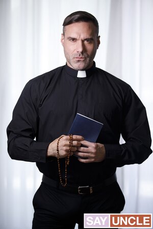 Father Skye pile-drives Adrian Hill hard on the stairs