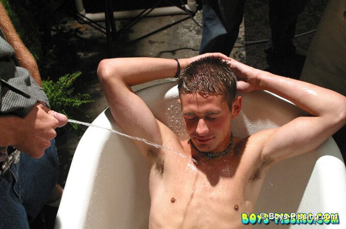 Shane Allen gets pissed on naked in outdoor tub