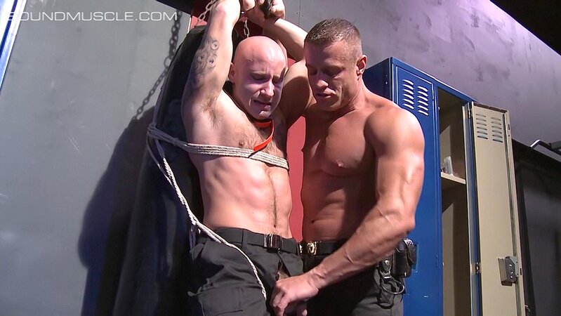 Sgt Tyler Saint electro-tortures officer Drake Jaden’s balls