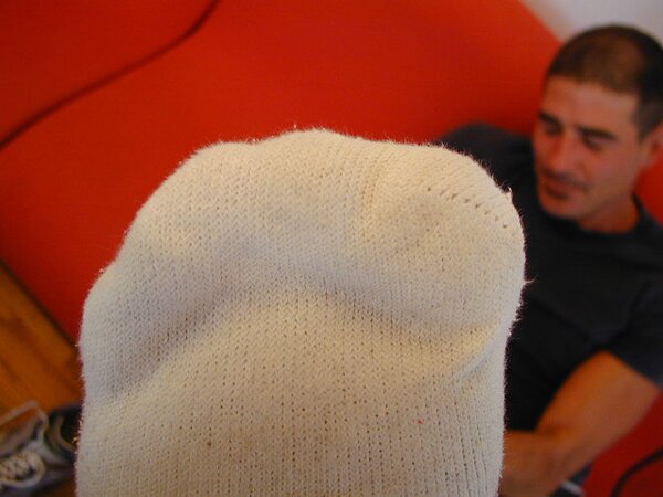 Big southern Frederick shows off size 14 feet and socks