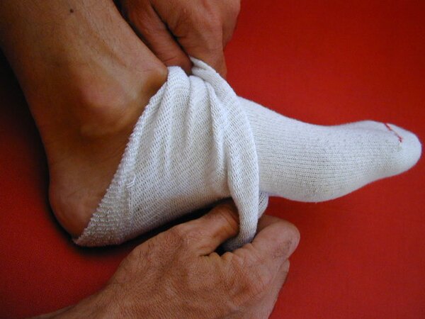 Big southern Frederick shows off size 14 feet and socks