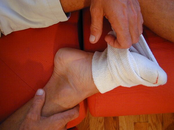 Big southern Frederick shows off size 14 feet and socks