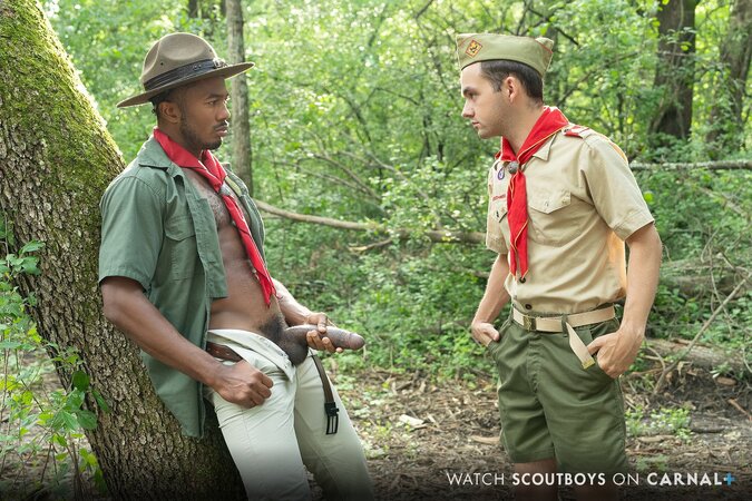 Scoutmaster Sean Xavier breeds tiny Scout Marcus in woods