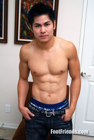 Asian muscle Scorpio shows off big feet in black socks