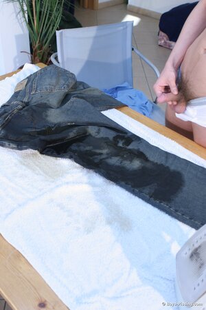 Kinky Adam pisses and cums on his clothes