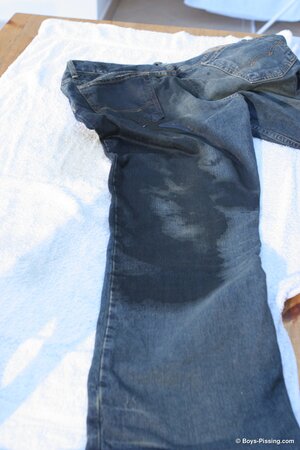 Kinky Adam pisses and cums on his clothes