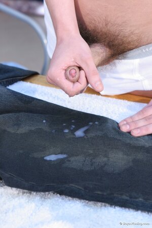 Kinky Adam pisses and cums on his clothes