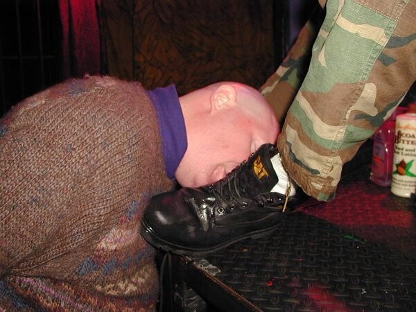 Private Benjamin demands boot licking service