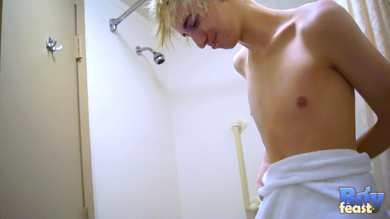 Erik strokes uncut dick solo in bathroom tease