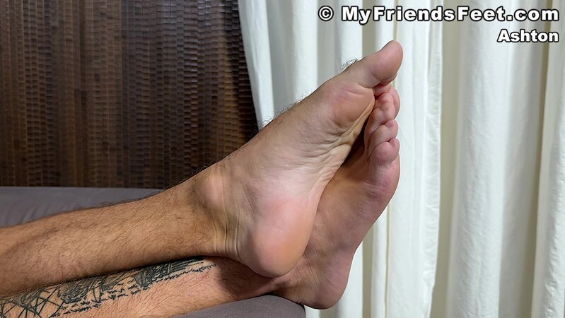 Ashton teases smooth soles in white ankle socks solo