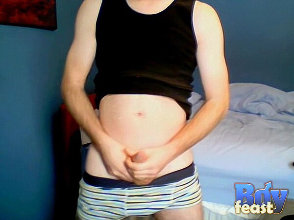 Aaron strokes slim cock and cums hard solo