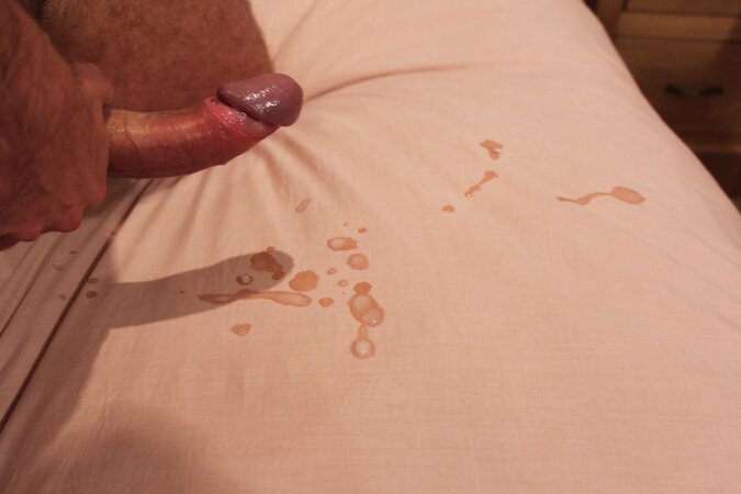 Mature Dylan Thompson shows off his huge curved cock outdoors