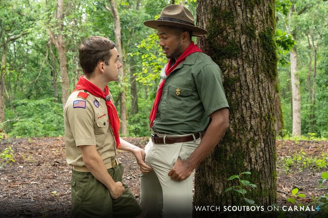 Scoutmaster Sean Xavier breeds small scout Marcus outdoors