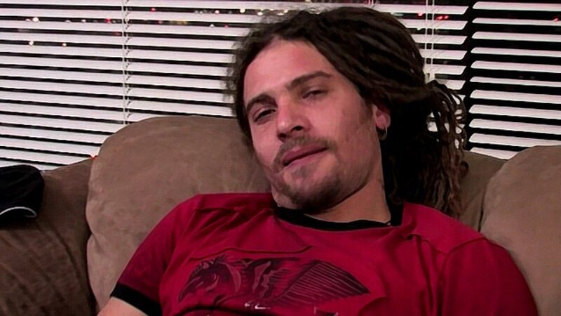 Dreadlocked Canu Eric strokes his pierced fat cock