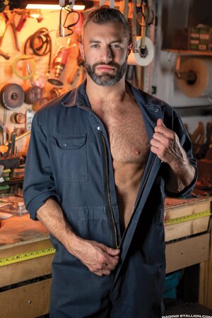 Pissed off driver Cole Connor takes out his frustration on mechanic Darenger’s huge cock