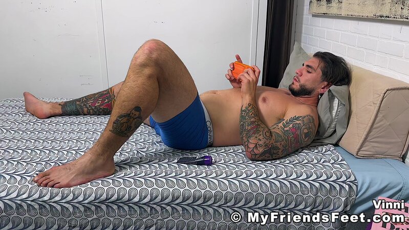 Vinni strokes out a massive load then uses his own cum to lotion his bare soles