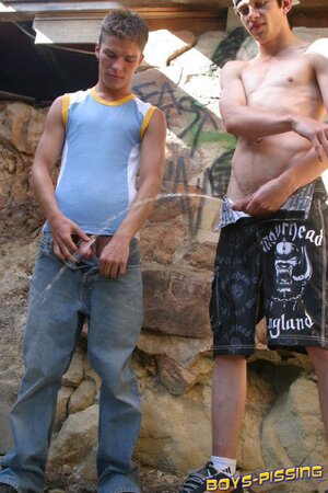Naughty twinks Ian and Brady piss together under the bridge like true troublemakers