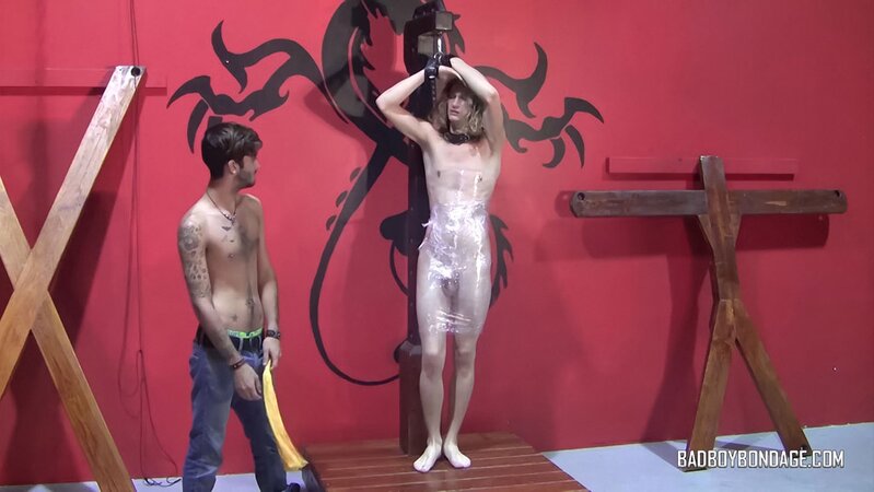 Ryann Ruckers unleashes his full collection of floggers on bound Chris Wayne