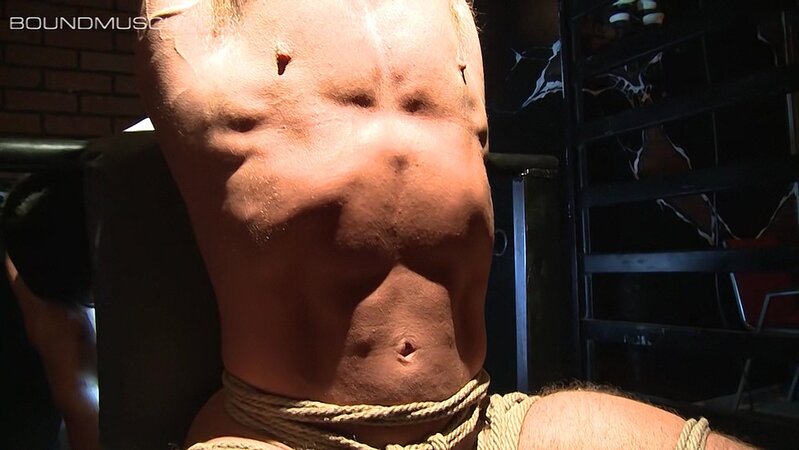 Derek Pain suffers intense electro torment while Master Mulengro watches him squirm