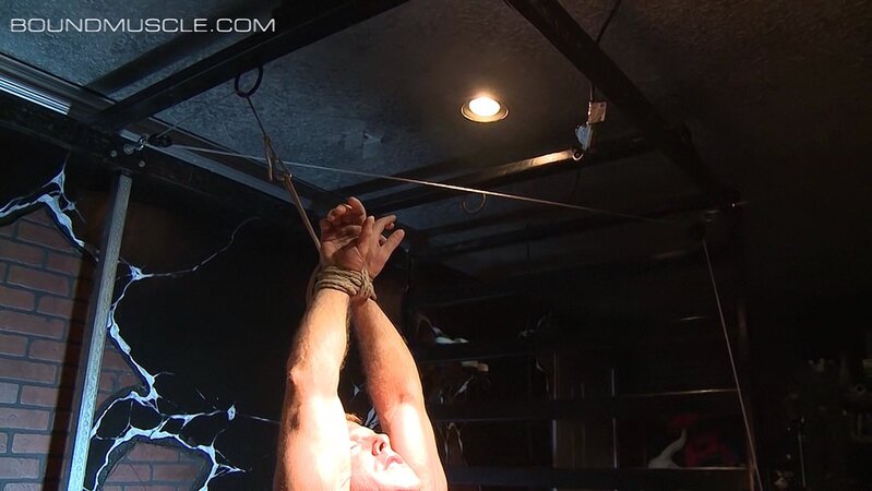 Derek Pain suffers intense electro torment while Master Mulengro watches him squirm