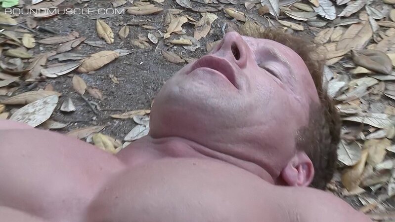 Derek Pain hangs upside down while Mulengro torments his sensitive nipples with heavy weights
