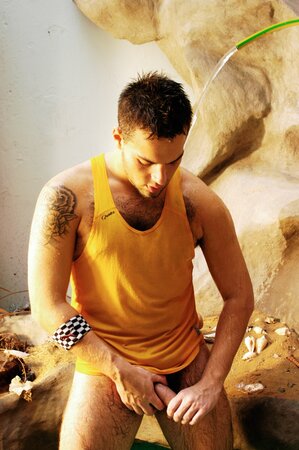 Horny Argentinean stud Sebastian flashes in the bathroom then cums hard on camera
