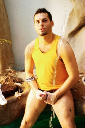 Horny Argentinean stud Sebastian flashes in the bathroom then cums hard on camera