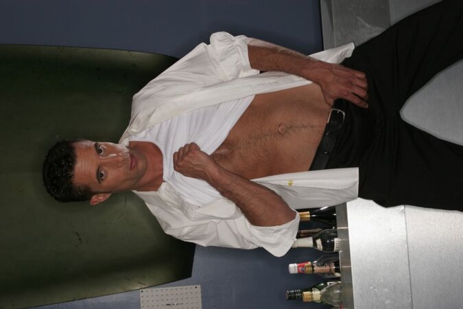 Handsome plumber stud poses and strokes his perfect ripped body