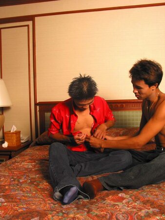 Three young asian twinks jerk their hard cocks in a hotel room