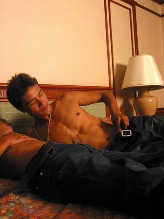 Three young asian twinks jerk their hard cocks in a hotel room
