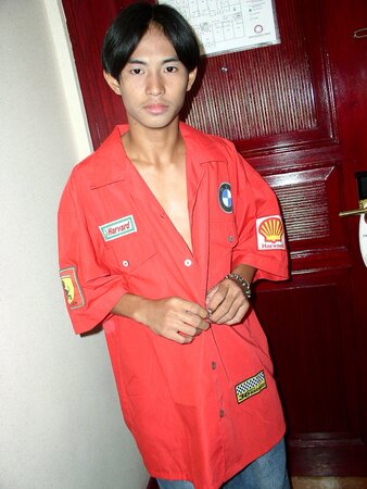 Cute young twink Bhoby strips out of his red shirt and baggy jeans