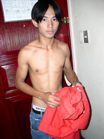 Cute young twink Bhoby strips out of his red shirt and baggy jeans
