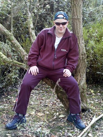 Young cub strips naked in the forest and pumps his fat cock dry