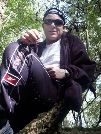 Young cub strips naked in the forest and pumps his fat cock dry