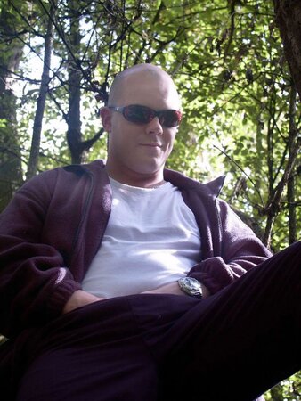 Young cub strips naked in the forest and pumps his fat cock dry