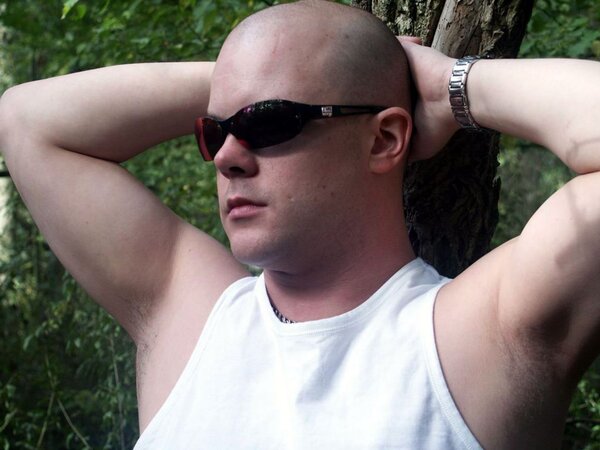 Young cub strips naked in the forest and pumps his fat cock dry