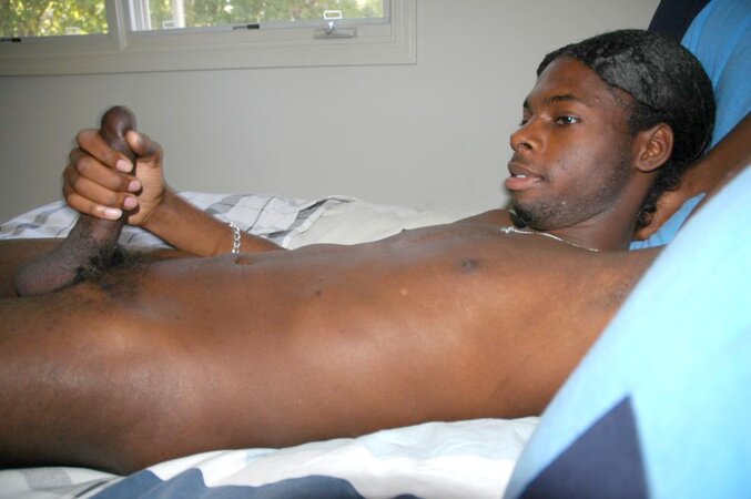 Black stud with a long uncut cock shows off his hot body