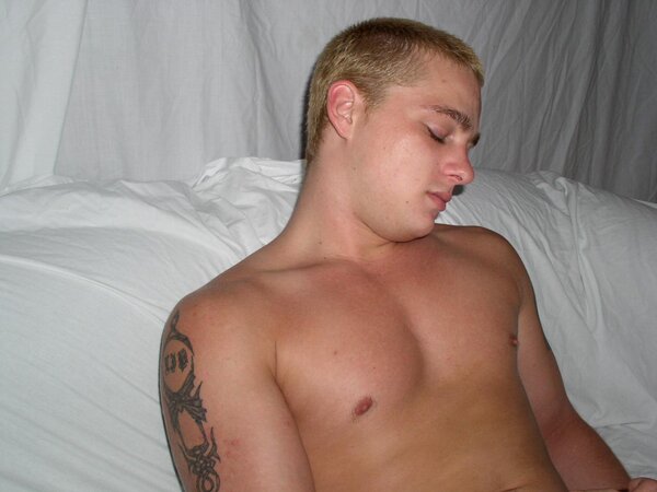Cute chubby twink shows off his soft belly and strokes his young cock