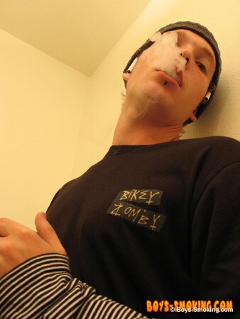 Skater boy Viper jerks his thick dick while smoking Newports in the bathroom