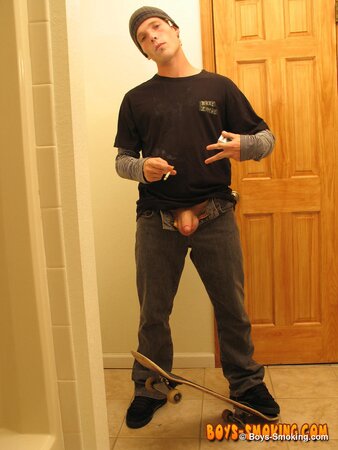 Skater boy Viper jerks his thick dick while smoking Newports in the bathroom