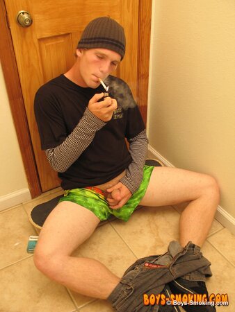 Skater boy Viper jerks his thick dick while smoking Newports in the bathroom