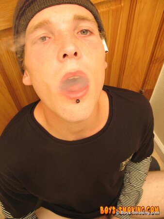 Skater boy Viper jerks his thick dick while smoking Newports in the bathroom