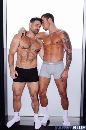 Daniel Justice dominates hairy hunk Beau Butler with deep foot worship and hard fucking