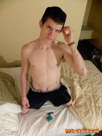 Buff twink Lex chainsmokes Newports while jerking his throbbing meat