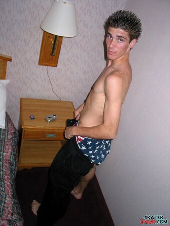 Evan Heinze teases in his boxer shorts and shows off his peachy ass