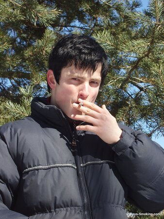 Buff stud Gus smokes and strokes his cock in the snow